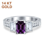 Three Stone Emerald Cut Gold Ring