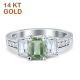Three Stone Emerald Cut Gold Ring