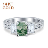 Three Stone Emerald Cut Gold Ring