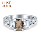 Three Stone Emerald Cut Gold Ring