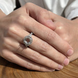 Round Halo Twisted Split Shank Diamond Ring