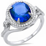Halo Swirl Engagement Ring Oval Simulated Blue Sapphire Round CZ 925 Sterling Silver